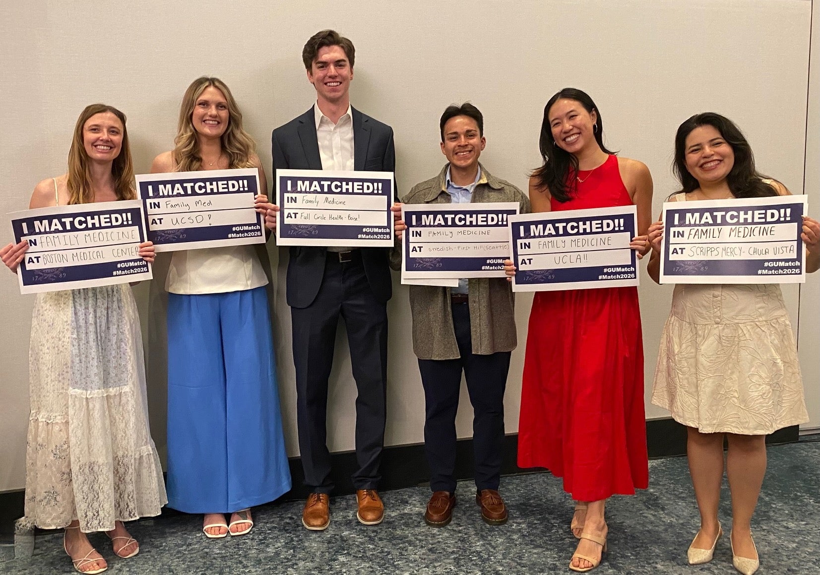 Students posing with I Matched!! signs on Match Day 2026.